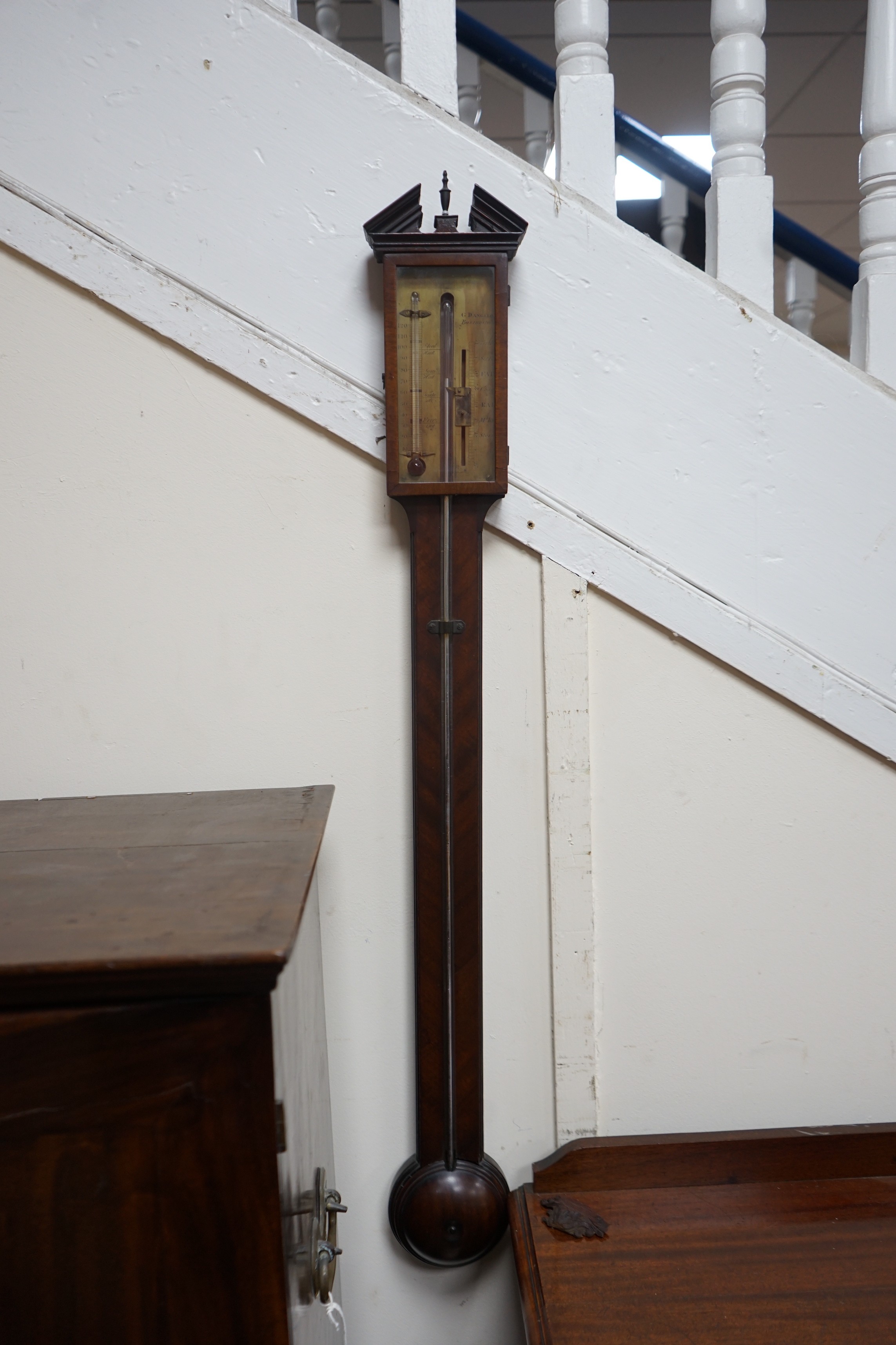 A George III mahogany stick barometer, the engraved brass dial marked Dangelo, Basingstoke, height 98cm